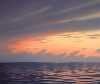 Abendliche Wolken am Meer